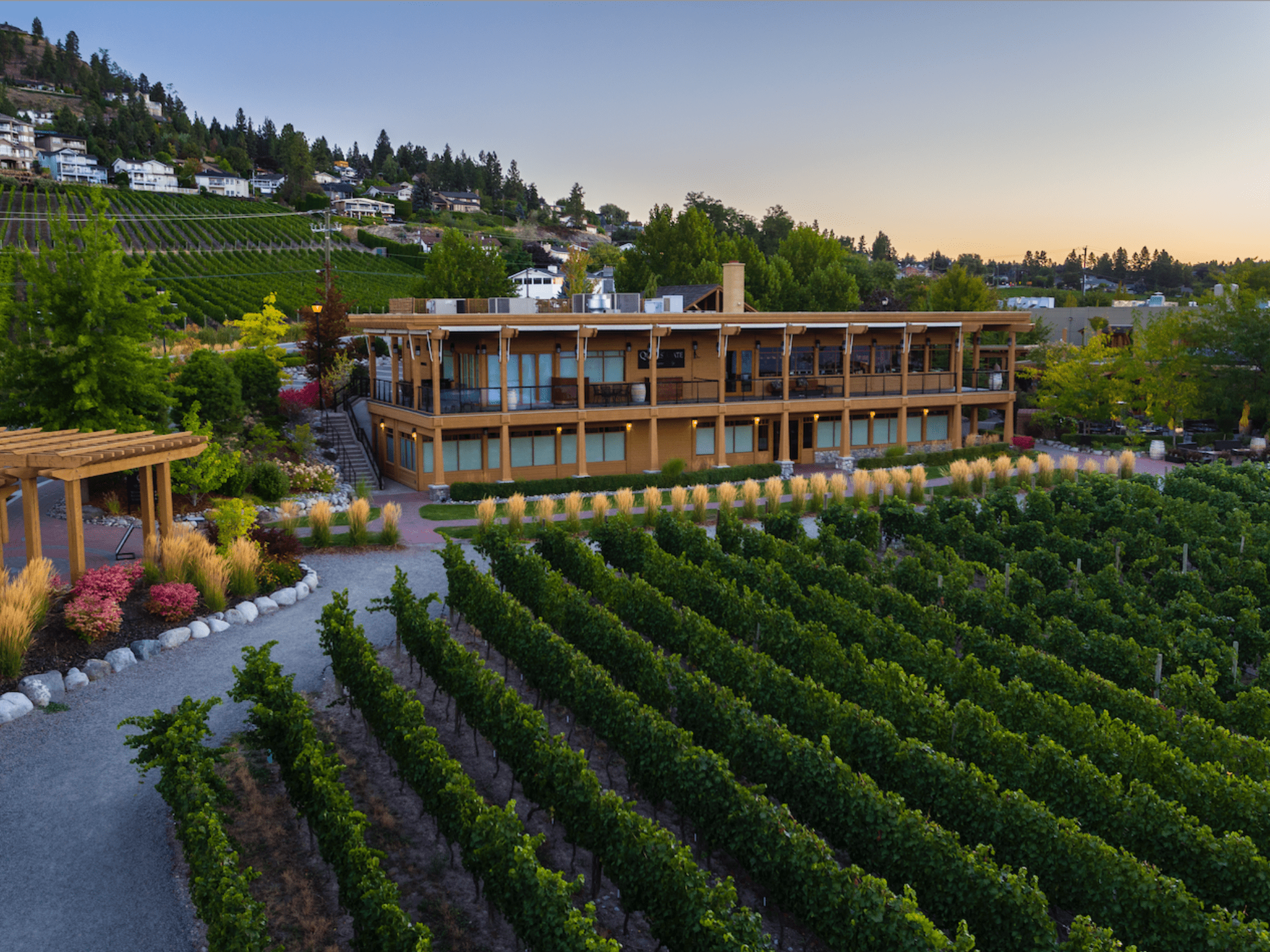 Quails Gate Winery vineyard and building at dusk West Kelowna